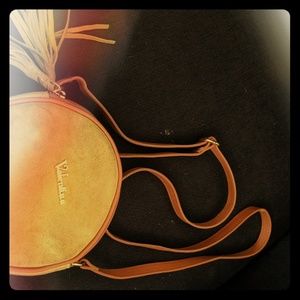 Long olive green bag with fringe zipper